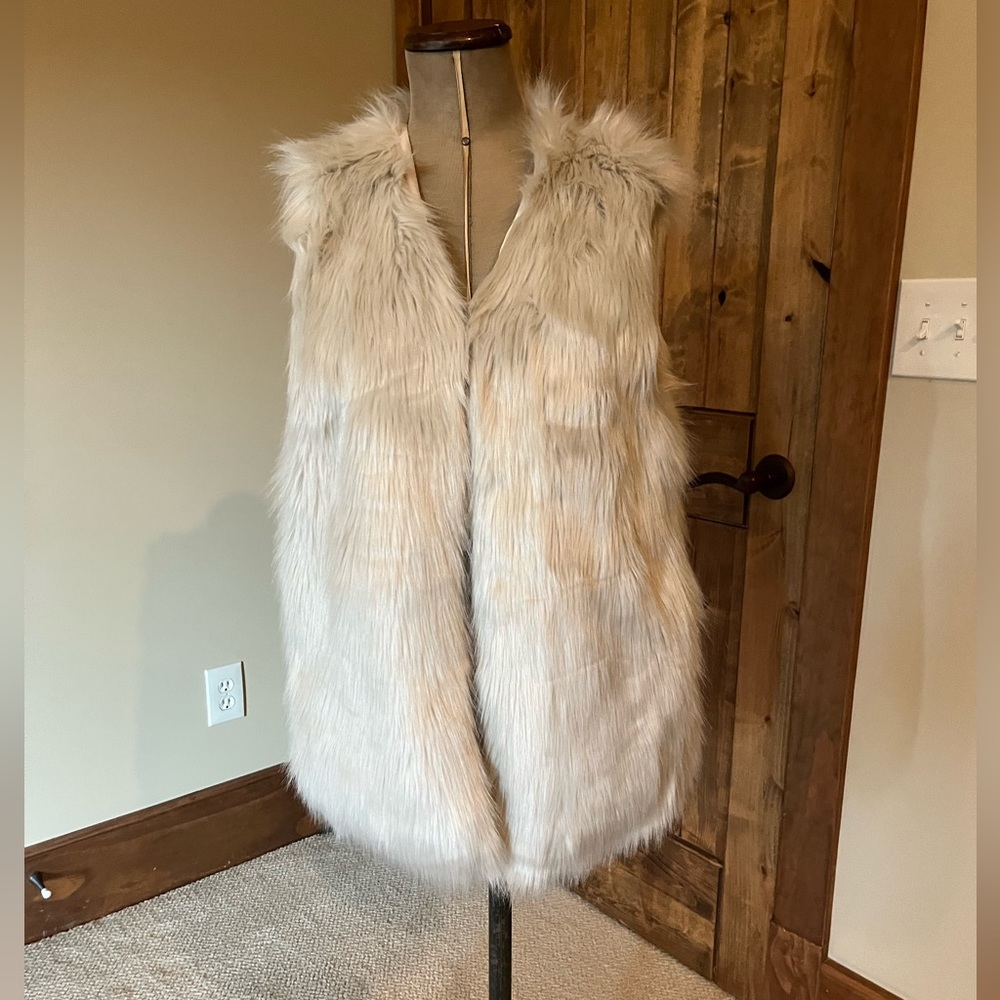 White faux fur vest